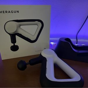 Theragun with charging stand